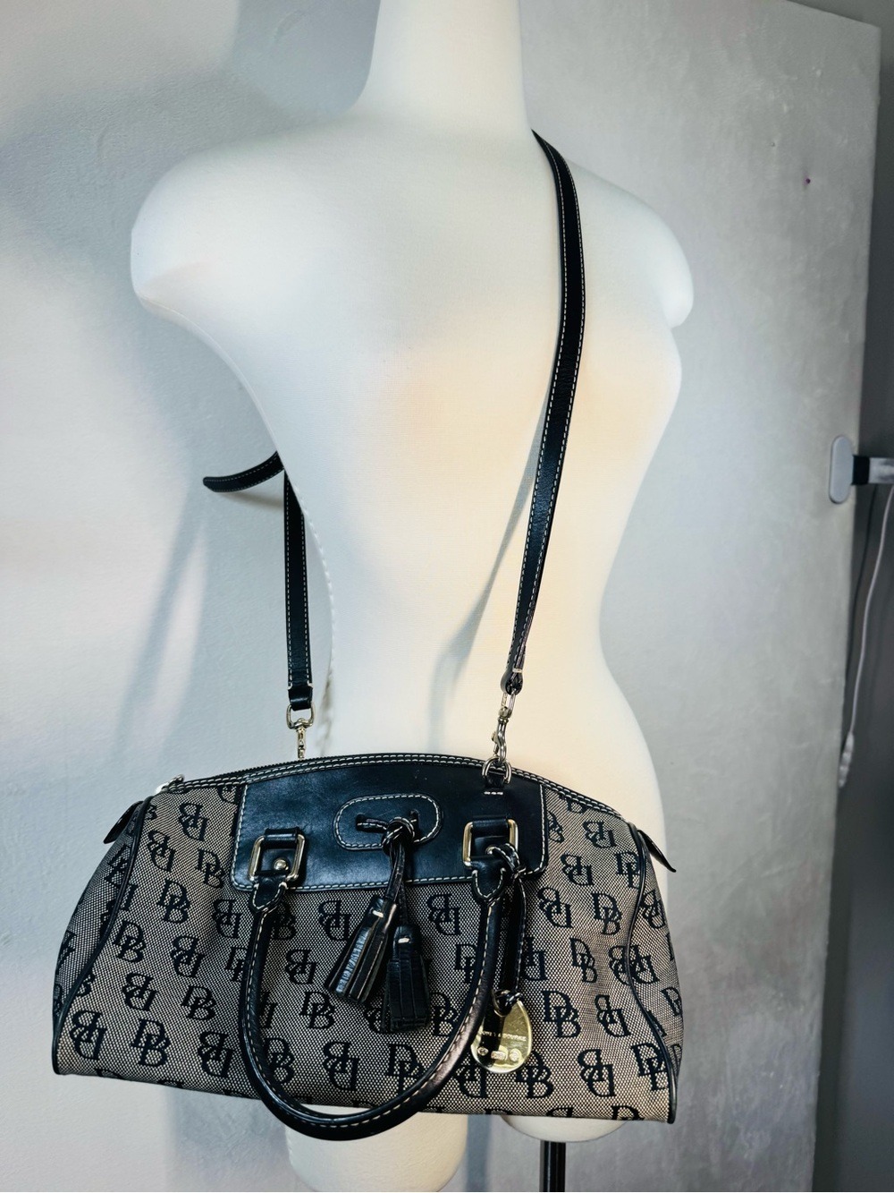 Dooney & Bourke Beige and Black Logo Satchel with Tassel Charm